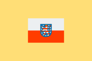 Hier ist die Flagge Thüringens zu sehen. Erfahre alles zum Thema Förderung Photovoltaik Thüringen 2024