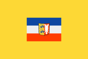 Hier sieht man die Flagge von Schleswig Holstein. Erfahre in diesem Beitrag alles über das Thema Photovoltaik Förderung Schleswig-Holstein